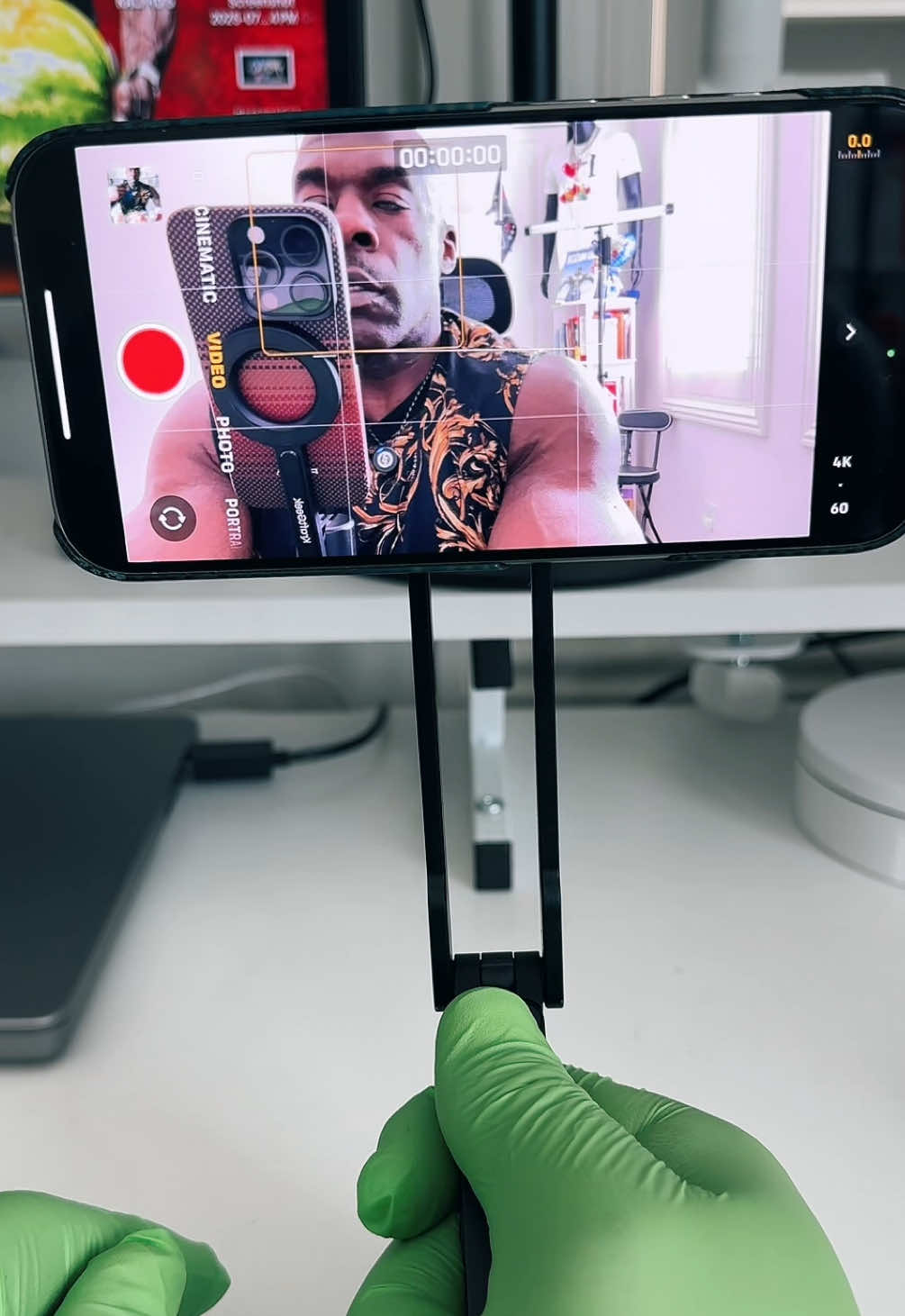 A post by @ on TikTok caption: #contentcreator  #tripodstand  #iphone  #ulanzi