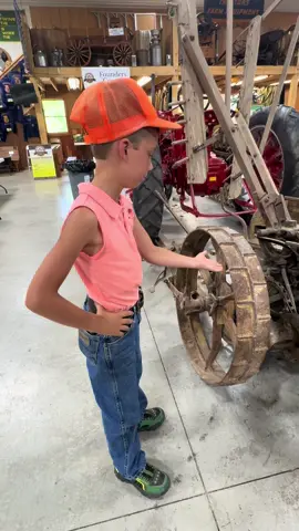A post by @justajacksonthing on TikTok caption: Jackson always enjoys seeing older equipment and talking about it. #justajacksonthing #makefarmingfun #farm #farmlife #futurefarmer #oldschool 