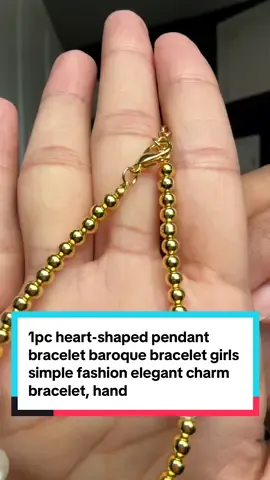 A post by @heyreemaa on TikTok caption: 1pc heart-shaped pendant bracelet baroque bracelet girls simple fashion elegant charm bracelet, handmade jewelry, perfect gift for mom, daughter. #heartshapependant #pendant #braclet #braclets #charmbracletes 