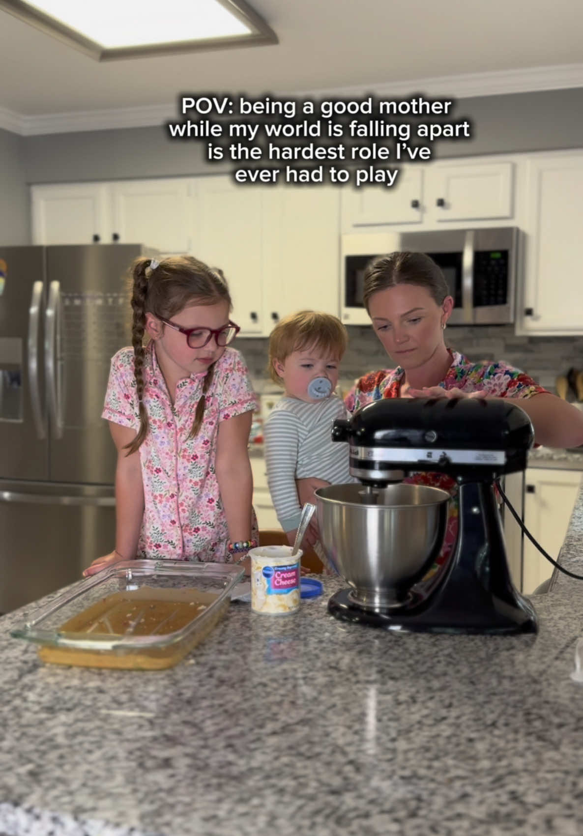 A post by @little_britt15 on TikTok caption: As a mom despite what your going through you get up, wipe your tears, put a smile on your face, and carry on even when you feel like you don’t have the strength too….because your babies need you!🤍🥺