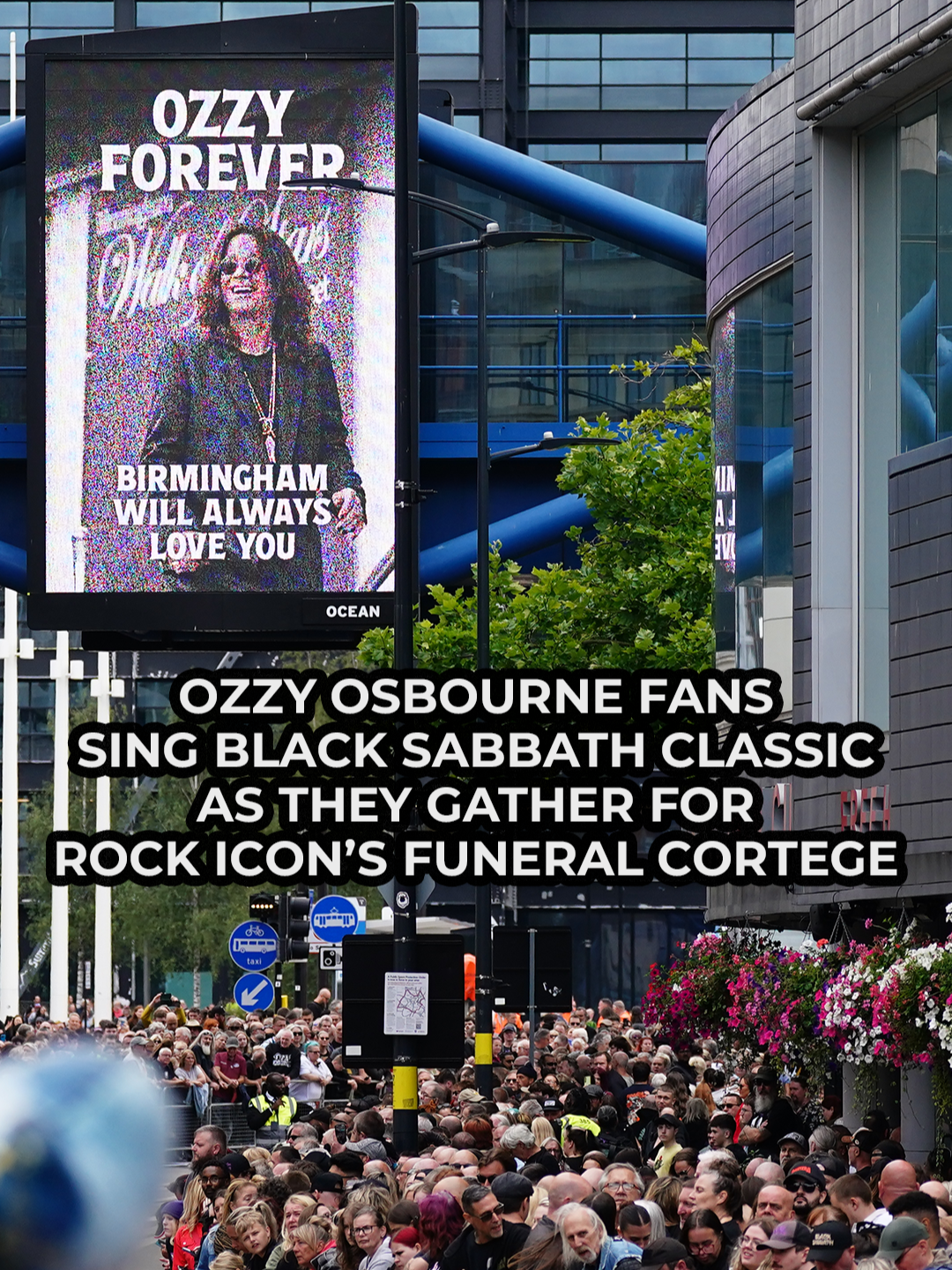 A post by @gbnews on TikTok caption: Ozzy Osbourne fans burst into a rendition of the Black Sabbath classic "War Pigs" as they gather on Birmingham's Broad Street for the rock icon's funeral cortege. #Ozzy #OzzyOsbourne #BlackSabbath #Birmingham #GBNews