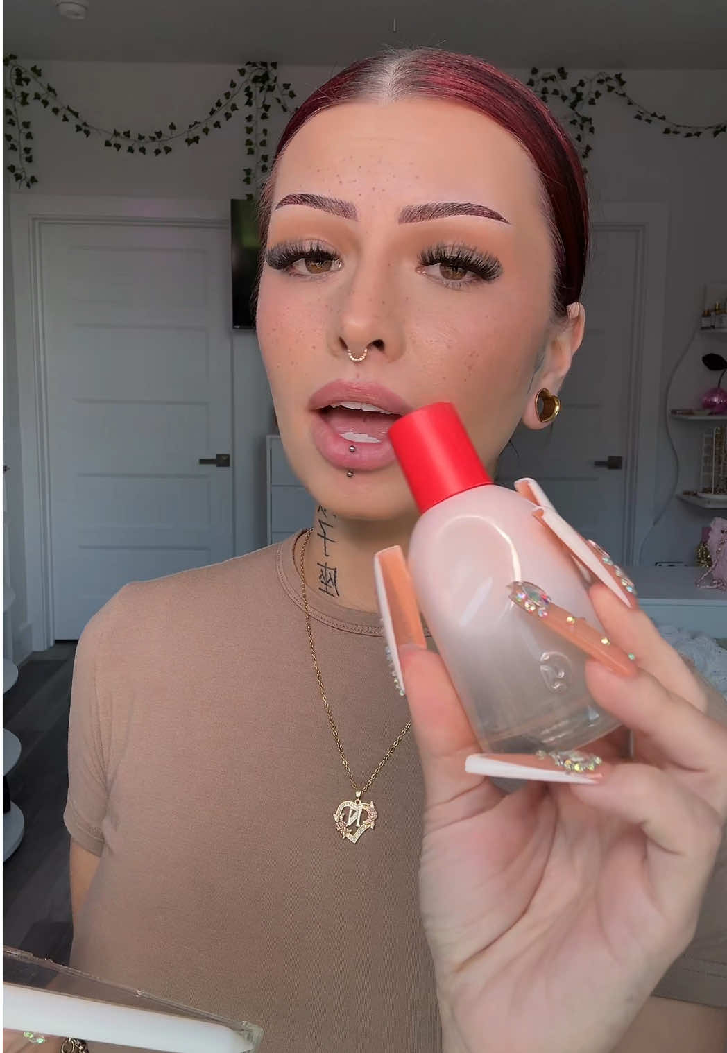 A post by @ on TikTok caption: This is my new go too scent 😍 @Glossier ate with this 🤩 #glossier #glossieryou #scent #perfume #eudeparfum #stargrl333 