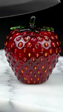 A post by @aismrvideoo on TikTok caption: #asmrvideo #asmr #ai #asmrsounds #satisfying #fruit #aiasmr #oddlysatisfying 
