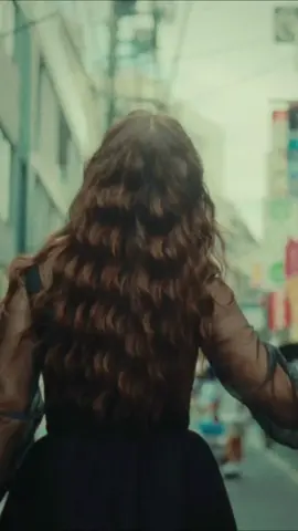 A post by @laufey on TikTok caption: lover girl music video out now 💌 filmed in tokyo and directed by @Junia !!