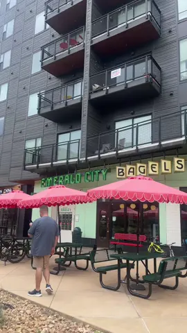 A post by @jasminahinton on TikTok caption: 100/10 definitely recommend #emeraldcitybagels #tastetest #jasminahinton #bagelshop #matcha 