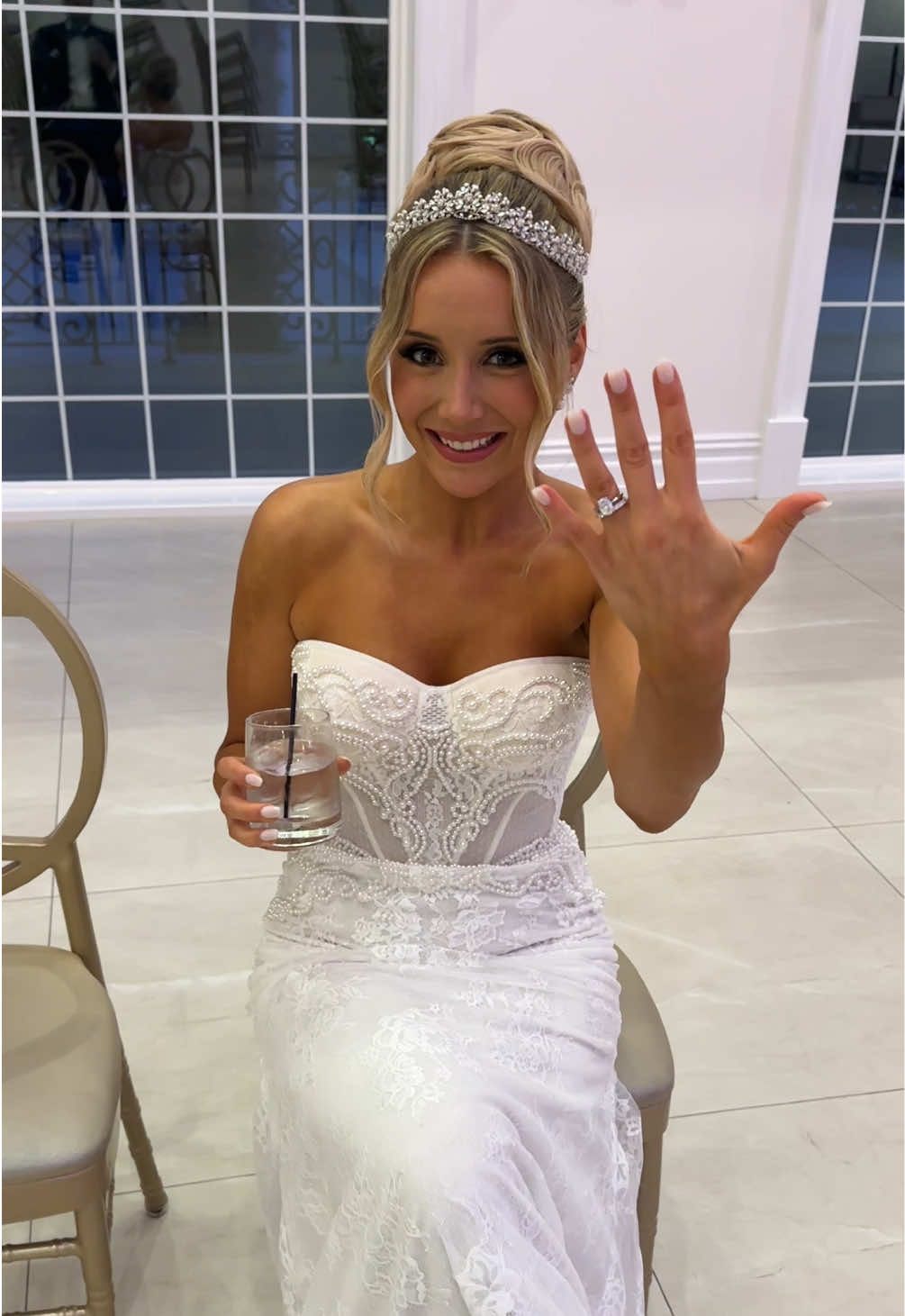 A post by @thefinancebrides on TikTok caption: after our ceremony & before the reception🥹💖 #justmarried #weddingtiktok #bridesoftiktok #2025bride #2025groom #weddingday #weddingdayvibes #weddingdayfun #weddingceremony #weddingreception #njbride #njwedding 