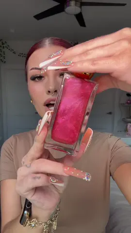 A post by @ on TikTok caption: 🍒🤩 @Truly Beauty #cherry #bodyoil #sparkle #shimmer #luxury #stargrl333 