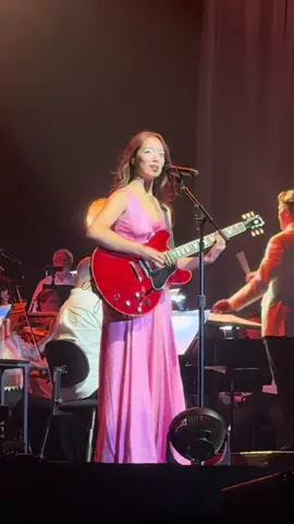 A post by @laufey on TikTok caption: silver lining hits different with orchestra <3 