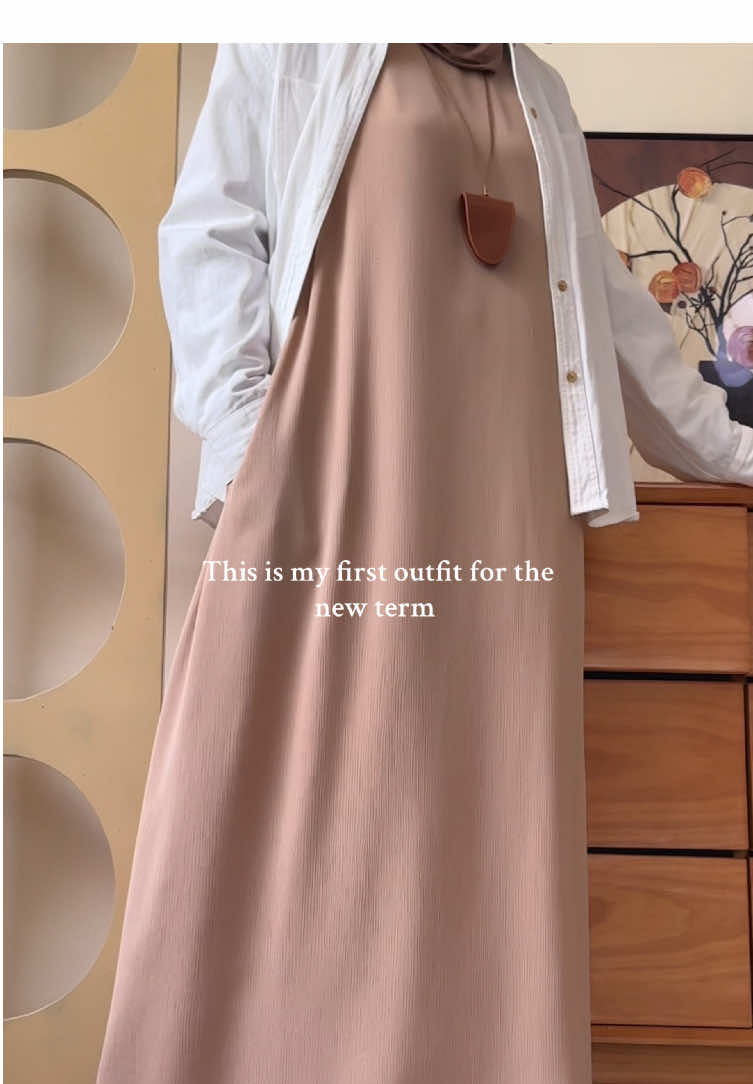 A post by @mariam_collections on TikTok caption: MA233 click on the link on my homepage to make a purchase 🔗：search:MA233#abayagirls #mariamscollection #schoolglow#abaya #studentoutfits     