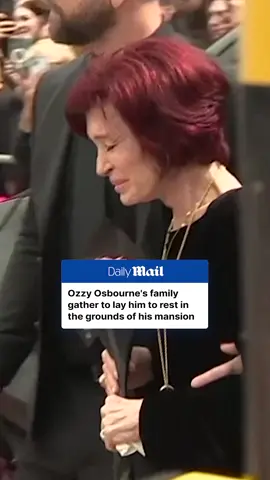 A post by @dailymail on TikTok caption: Ozzy Osbourne's widow Sharon and her family are today laying the heavy metal icon to rest in a private funeral at his Buckinghamshire home. The Black Sabbath frontman is being buried in a freshly dug grave close to the lake at the heart of the sprawling 250-acre property. A huge floral tribute in the grounds of the mansion spells out an affectionate tribute to the heavy metal legend, with the words, 'OZZY F***ING OSBOURNE', on the banks of the Osbourne lake. Read the full story at DailyMail. #ozzyosbourne #news #funeral #rock #music 