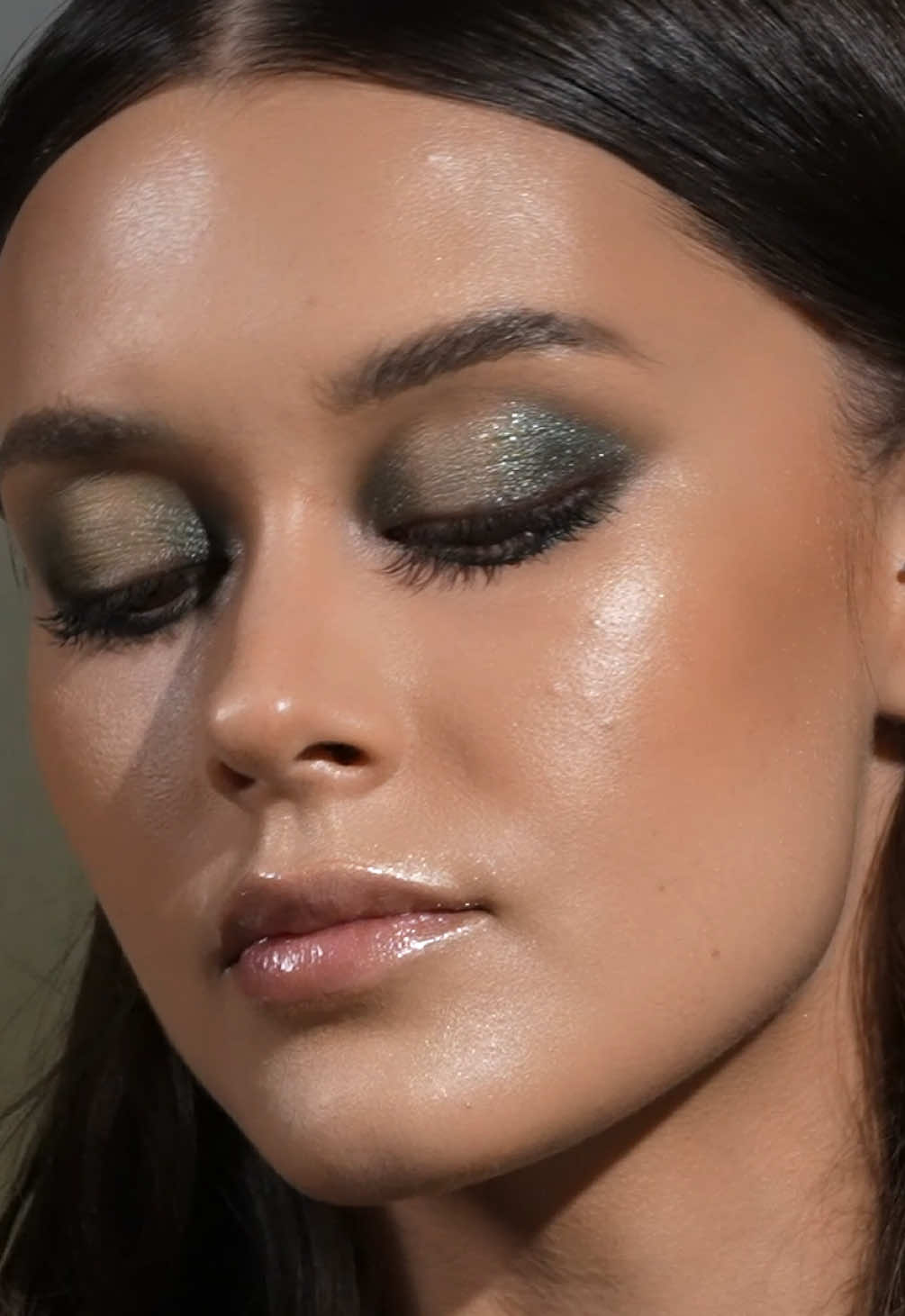 A post by @natashadenona on TikTok caption: MOSSY HALO GLAM full face tutorial ft. my NEW MINI GLOOM PALETTE ⭐ See below for all products I have used!!! #makeupbynatashadenona Makeup Details:  Base: HY-GEN PRIMER SERUM  HY-GLAM CONCEALER R4 - under eyes HY-GLAM CONCEALER N7 - spot concealer  HY-GLAM POWDER FOUNDATION N6  HY-GEN SKINCARE INFUSED GLOW BEAUTIFIER 02  Eyes: MINI GLOOM EYESHADOW PALETTE MACRO TECH EYE CRAYON shade Brown -  lashline Cinder - smoke inner and outer corner Moss - blend inner and outer corner, crease, lower  lashline   Zephyr - center eyelid  Verdant - inner and outer corner, lower lashline  Glint - tear duct  Contour: HY-SCULPT LIQUID BRONZER  shade Foxy Lips: MY DREAM Lip Gloss shade Natasha   #explore #natashadenona #minigloompalette 