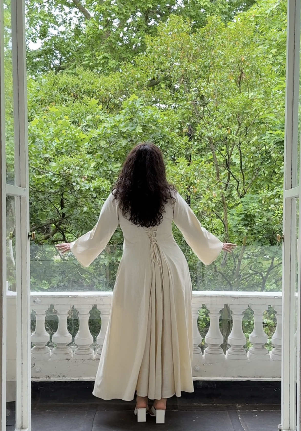 A post by @byhasanat on TikTok caption: Fit to perfection, designed for summer☀️ Our most loved Lemon Linen Dress returns on August 1st at 12PM BST, with sizes and lengths for everyone ✨ #modestfashion #modest #modestdress #summerstyle #summer #hijabi #modesty 