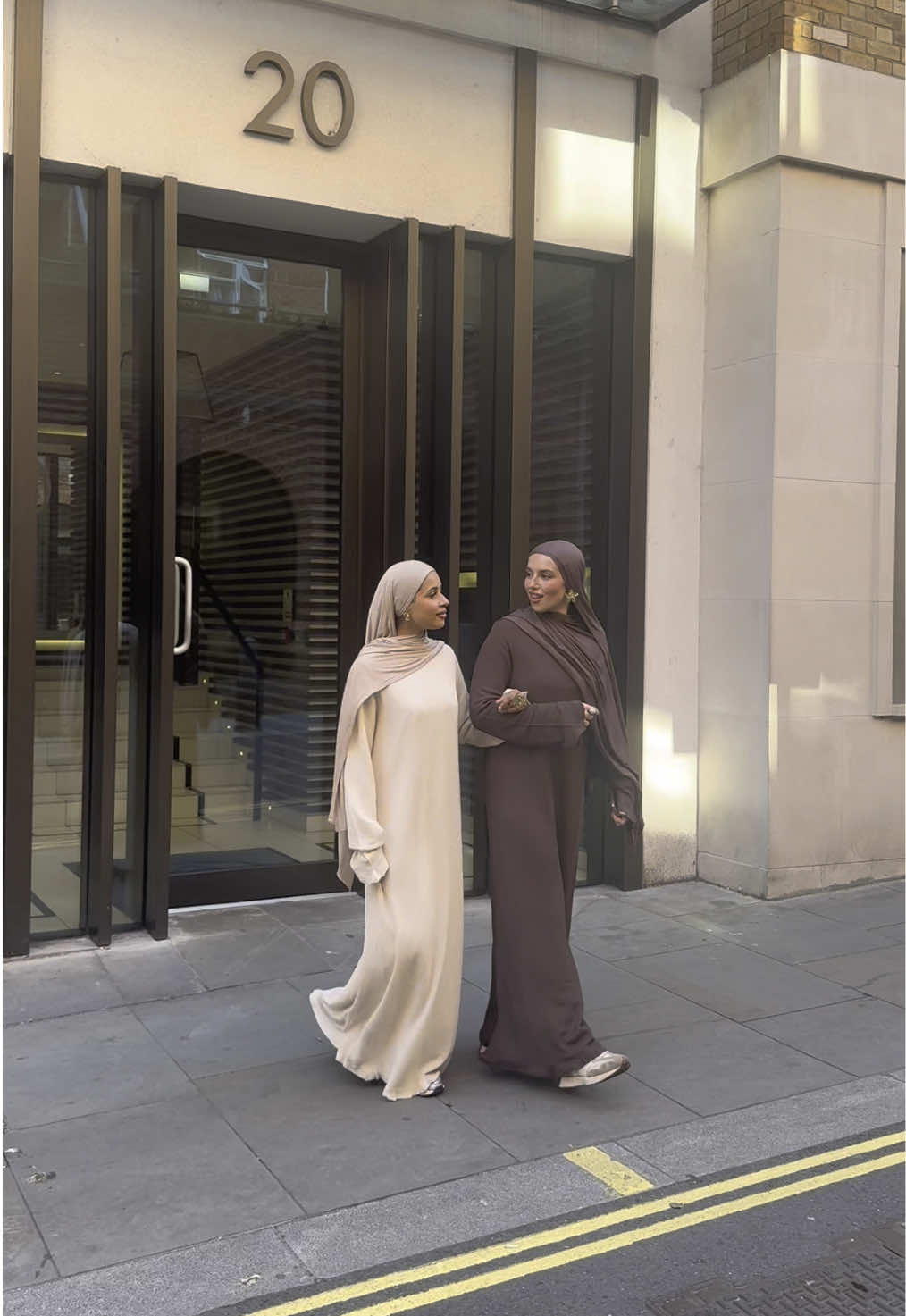A post by @hawaa_clothing on TikTok caption: Carrie Bradshaw, who? 🚕👠 Two besties, one iconic Hawaa crochet dress ✨ #hawaa #hawaagirlies #modestclothing