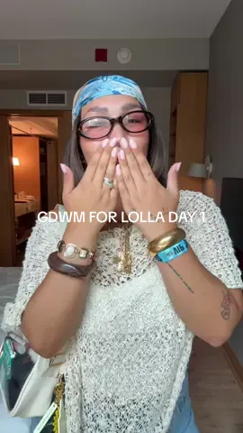A post by @isa_kristen22 on TikTok caption: get dressed with me for lollapolooza day 1 ✨🪩🌀 outfit details: poncho is old!! jorts @abercrombie jewelry and accessories @Amazon  sunnies @gentlemonster  @Gucci flora @noyzfragrance detour  @Saltair Body body lotion shoes @New Balance  @Ulta Beauty  #gdwm #getdressedwithme #lollapolooza #chicago 