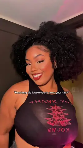 A post by @ on TikTok caption: Want to know how I grew my hair so fast? 🥰 Here’s the tea  #curlyhair #syntheticwig #halfwig #curlywig #afrowig 