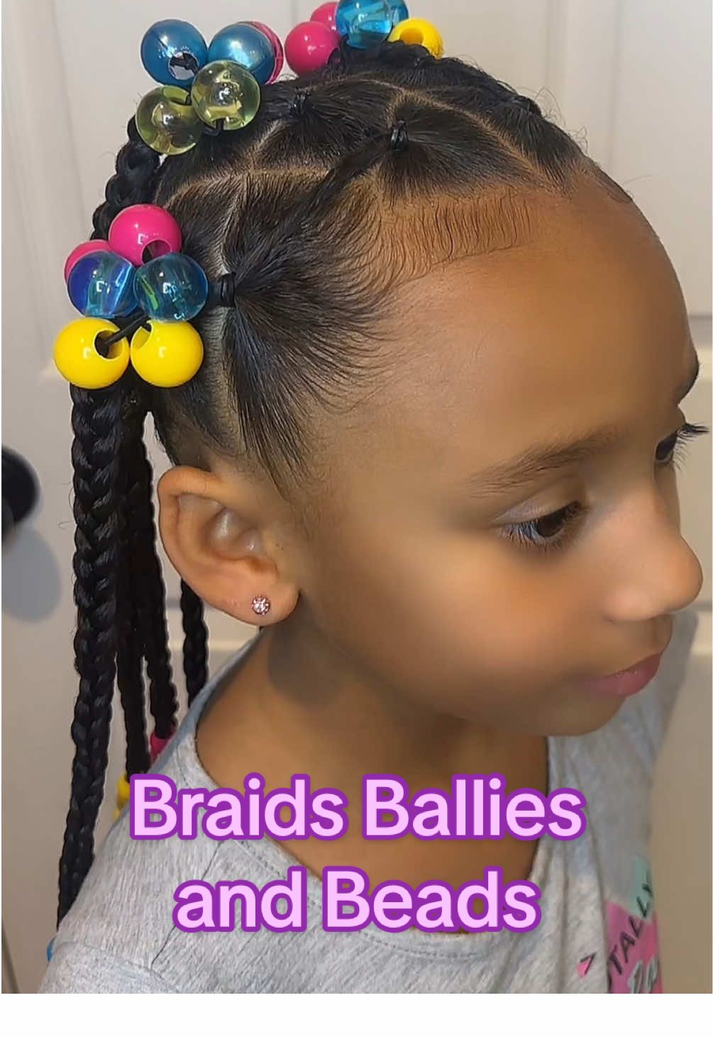 A post by @kickinitwith_kt on TikTok caption: Back with another cute style. Shout out to @Moriya for this one. We googled hairstyles and your babygirls video popped up. She said I want my hair like that! I think I delivered. Thanks for the inspo girl! 🩷 Yall make sure to go follow her for more cute hairstyles.  #hair #hairstyle #braids #twists #beads #ballies #mixedgirl #baskandlatherco #edgecontrol #gel #hairoil #inspo #chrisbrown #fyp 