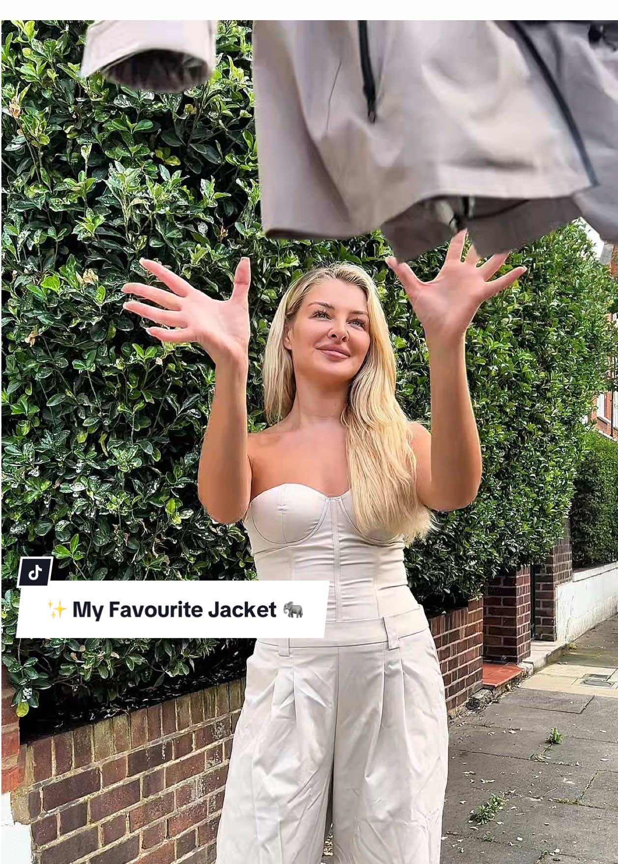 A post by @puffit.uk on TikTok caption: Lemme try on my favourite jacket, and show u guys 😊 ✨ #puffit #tiktokshop #raincoat #sale #neutraltones 