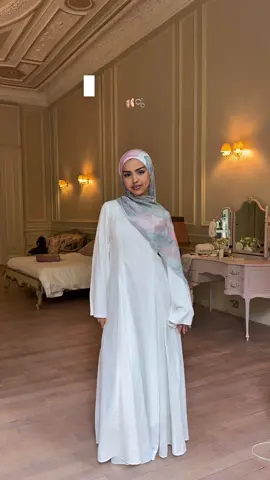 A post by @byhasanat on TikTok caption: Too many styling choices with this gorgeous staple dress🙊🎀 How would you style her?  #modesty#modestfashion#summerinspo#ootd#modestdress#abaya#modeststyle#hijab#grwm#styling#stylewithme#pinterest#explore#outfit 