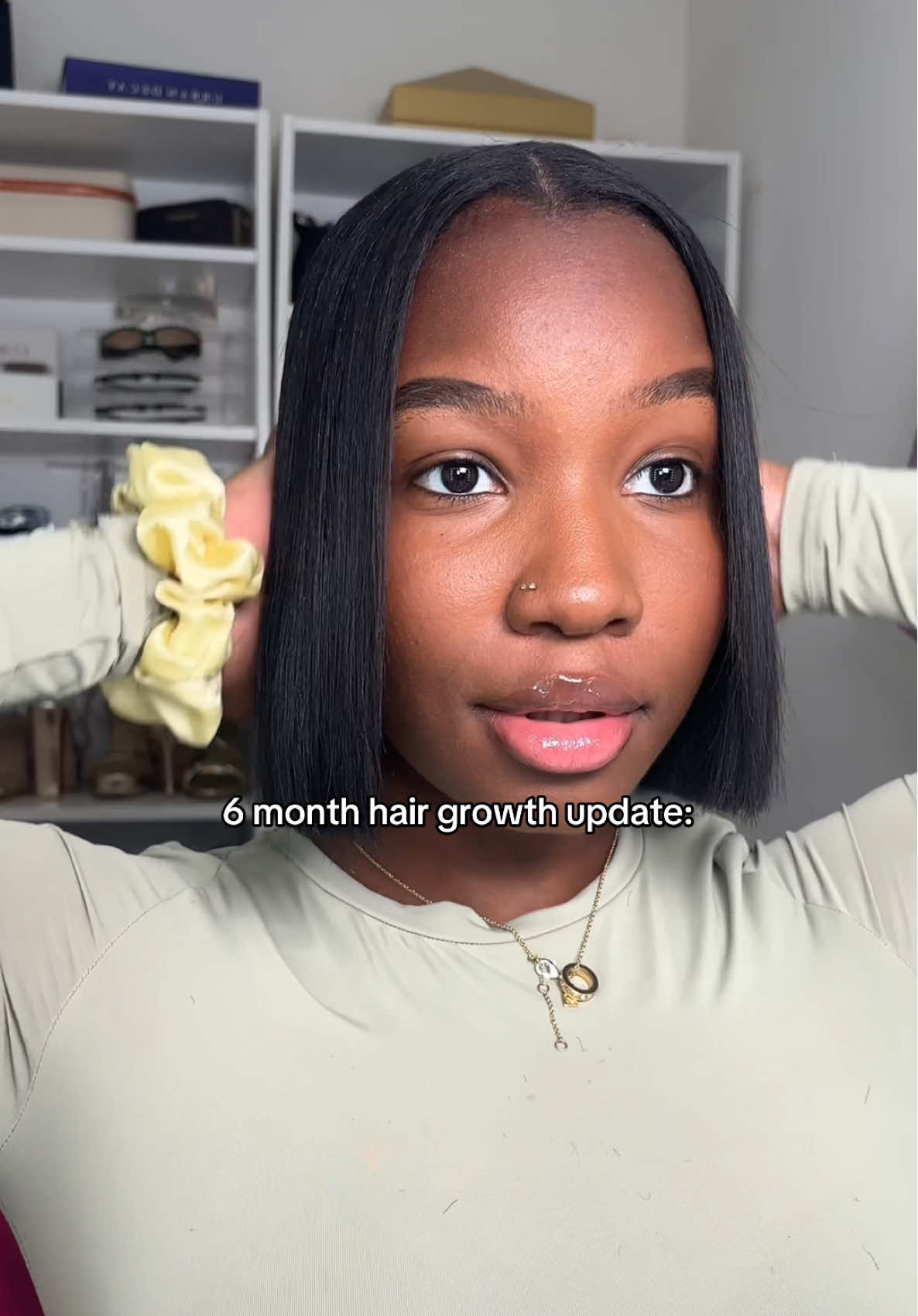 A post by @ on TikTok caption: As much as I love a good clean bob the fall season is approaching and nothing screams fall like a fresh long silk press and my brown wardrobe essentials😫🍂 I cannot waittttt #hairgrowth #newhair #shorthair 