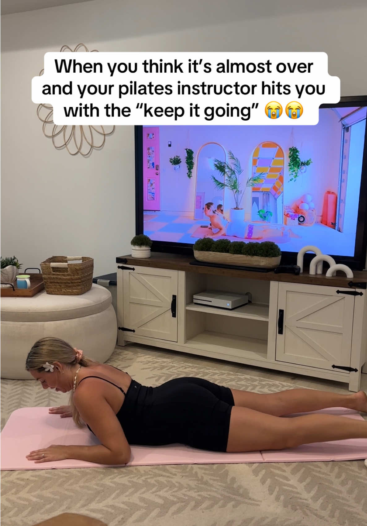 A post by @calliegualy on TikTok caption: Pilates never fails to humble 🥵 join the 21-day pilates challenge lN Bl0 #pilates #pilatesworkout #fitness #pilatesgirl 