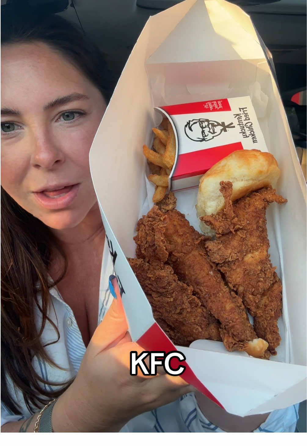 A post by @katiesantry on TikTok caption: What’s your fav fast food chicken? I can tell you it’s not KFC for me 🍗🐓 #kfc #mukbang #drivethru #fastfood #dinnerwithme 