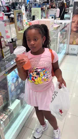 A post by @peach.mcintyre on TikTok caption: SHOP WITH PEACH 🍑 PEACH McINTYRE 🍑 BUYS HER 8 YEAR OLD ONLY DAUGHTER 👧🏽 GORGEOUS PURPOSE HER OWN DONNA KAREN DEODORANT, BODY WASH AND BODY LOTION 🧴 