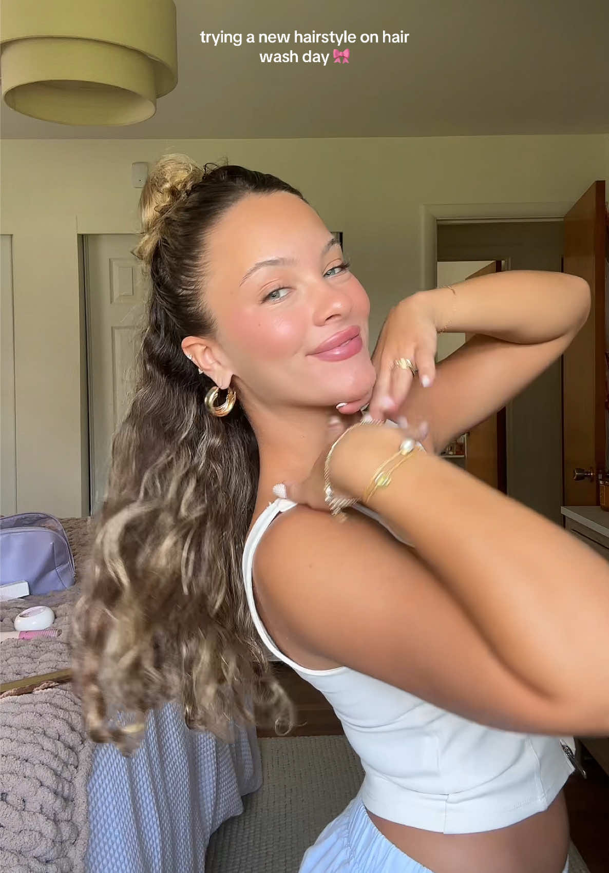 A post by @annadawnphillips on TikTok caption: idk i think she’s cute 🤷🏼‍♀️🫶🏽 @THE OUAI @Gisou #hairstyle #hairtok #hair #curlyhair #hairwashday 
