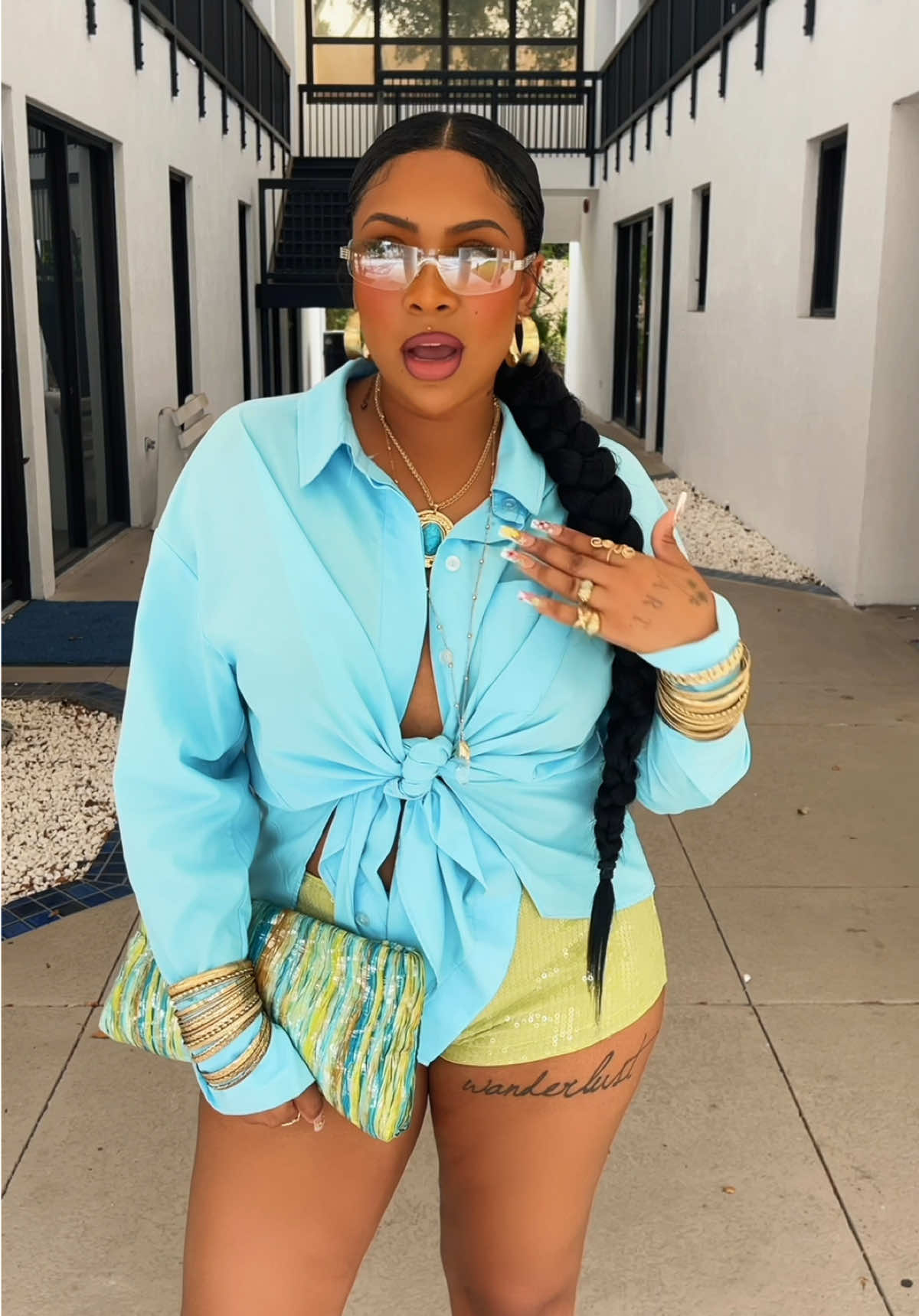 A post by @exe_eve on TikTok caption: These colors are everything tg! Love this OOTD 💚💙 Will be wearing this out of the country! @prettylittlething @Giant Vintage Sunglasses @SHEINUS @FOREVER 21 #outfitdetails #outfitideas #outfitinspo #vacationoutfits #holidayoutfits 